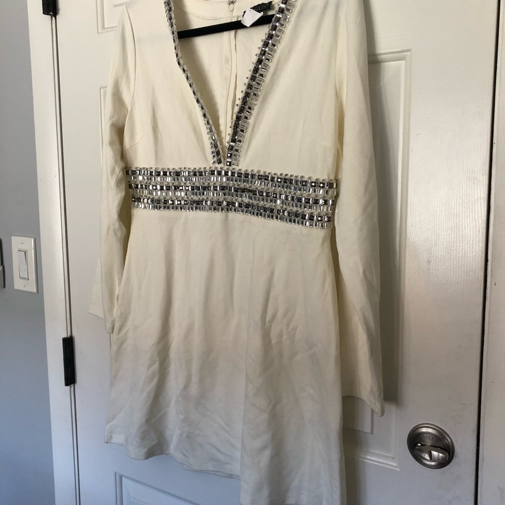 Brand new never worn Venus deep v dress